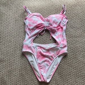 Gently worn size small, trendy cut out one piece